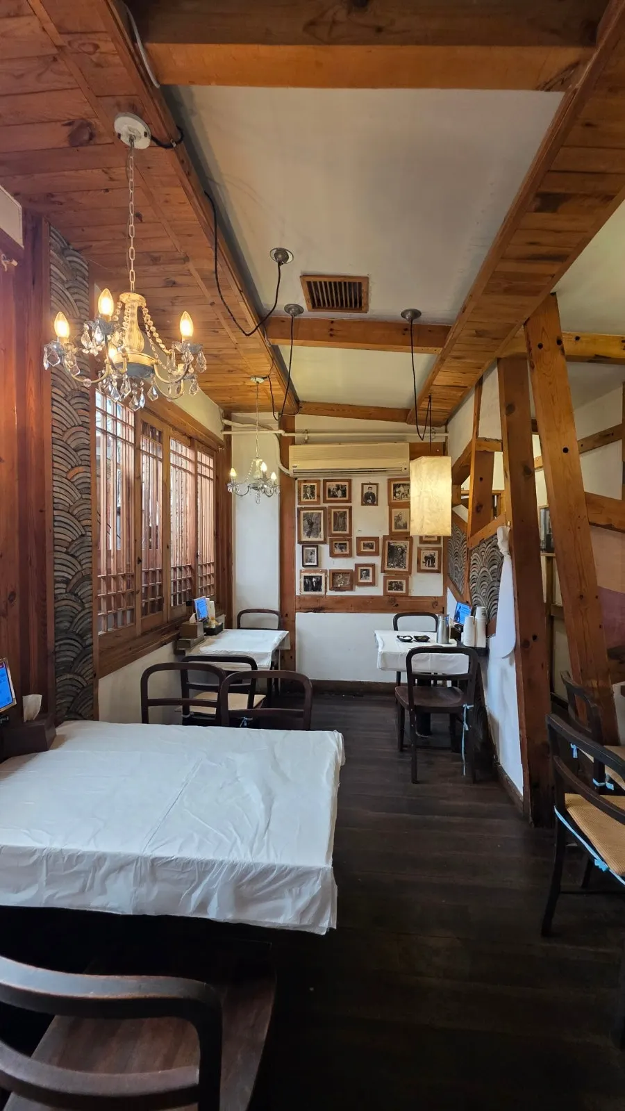 Interior seating and hanok atmosphere of the makguksu restaurant