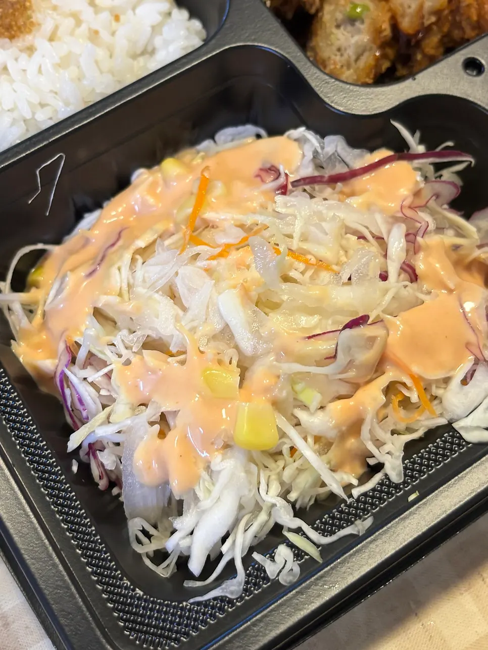 Broth soup, diced radish kimchi, pickled radish, and salad spread