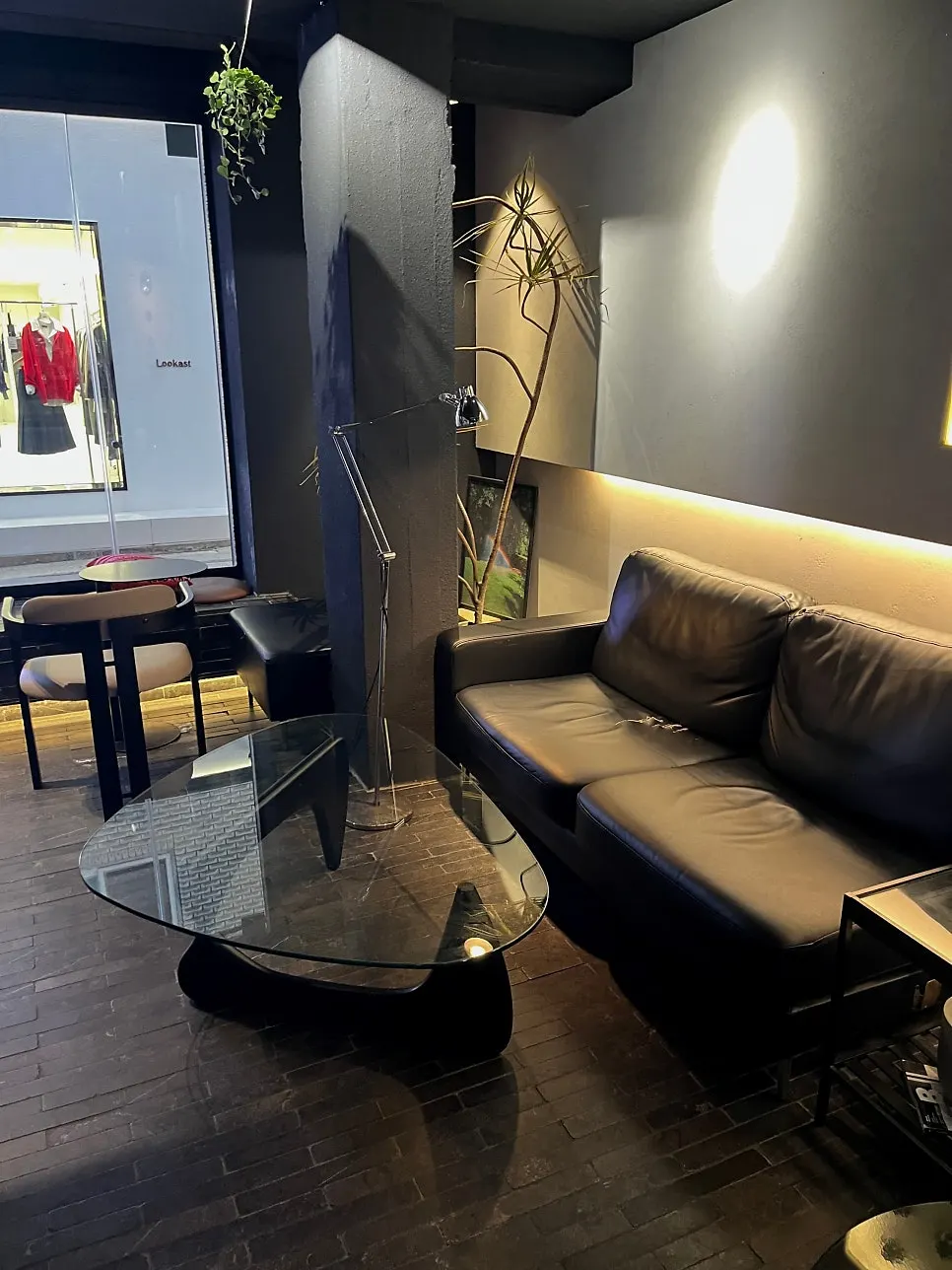 Dark gray-toned interior of Iridescent