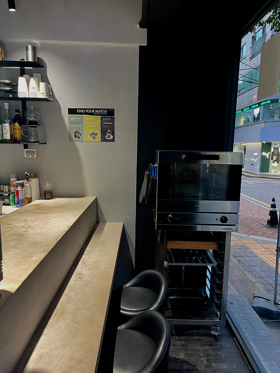 Seating with a view of the Seongsu alley through the windows