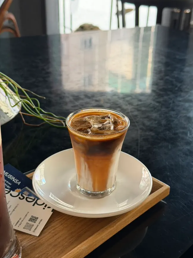 Close-up of a cup of Iridescent latte