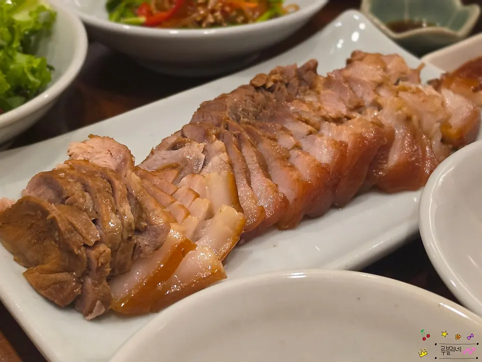 Close-up of side dish plates from the sanghwang loach soup set