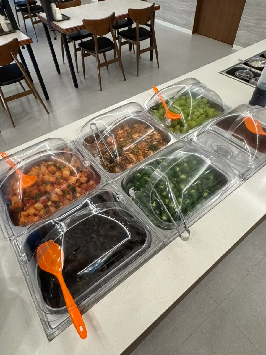 Irojeong self-serve bar with thin noodles and side dishes