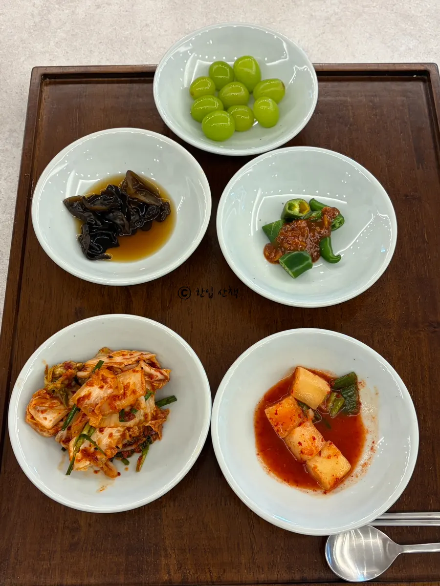 Basic side dish spread with kimchi and diced radish kimchi