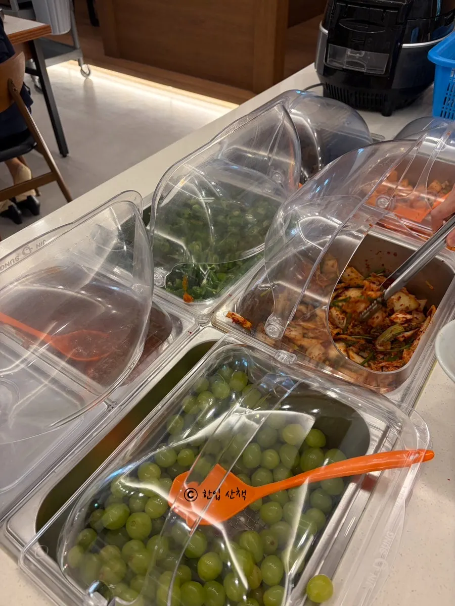 Self-serve side dish bar in the middle of the hall