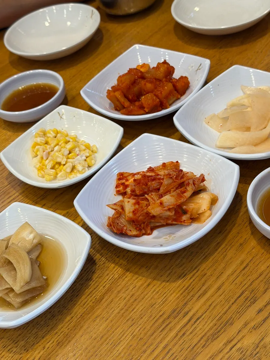 Generous side dishes served with naengmyeon and galbitang