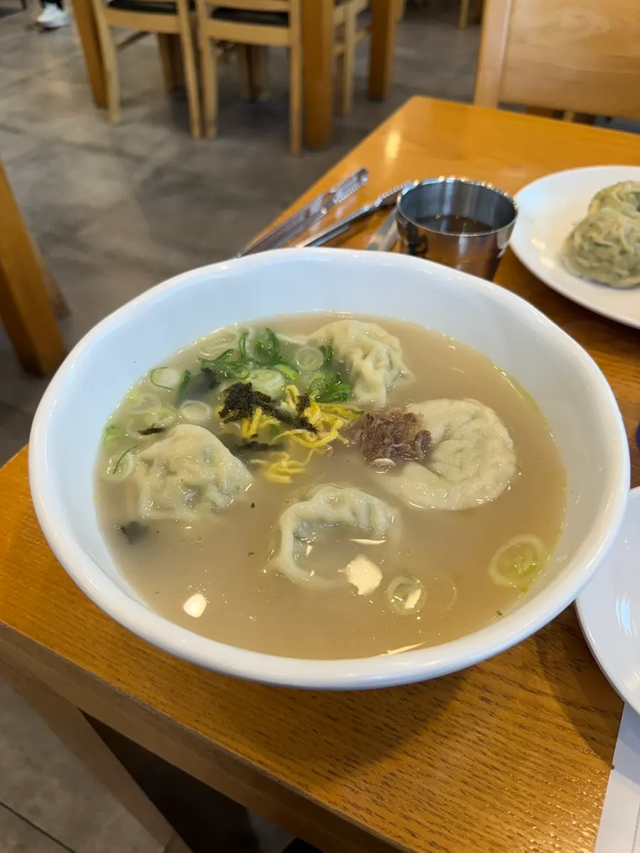 Lunch spread of bibim naengmyeon, wang galbitang and tteok-mandu-guk for three at Iseol Myeonok Suyu Main Branch