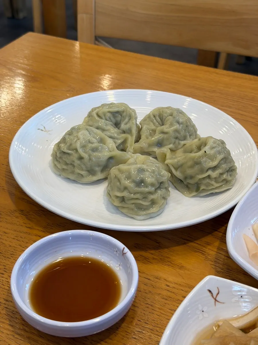 A plate of king mandu packed full inside
