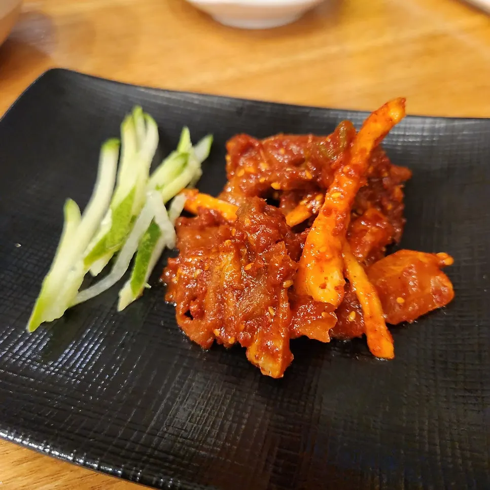 Mukjuk (acorn jelly) and japchae among the basic side dishes