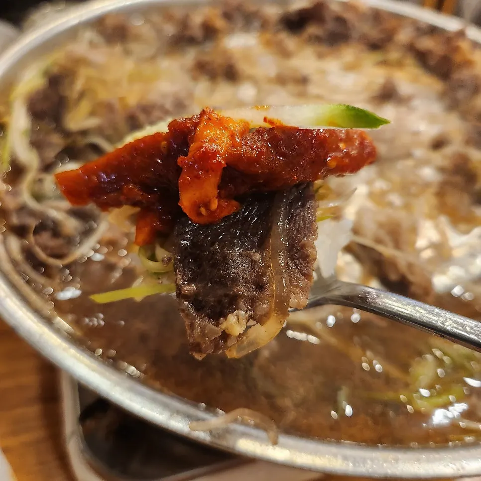 Rice mixed into bulgogi broth