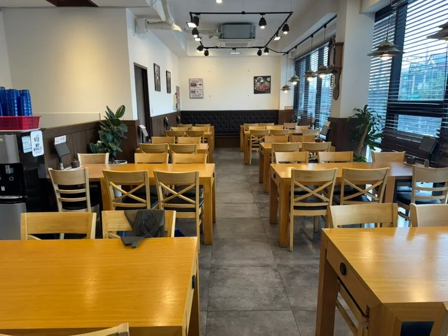 Second-floor seating with wide tables