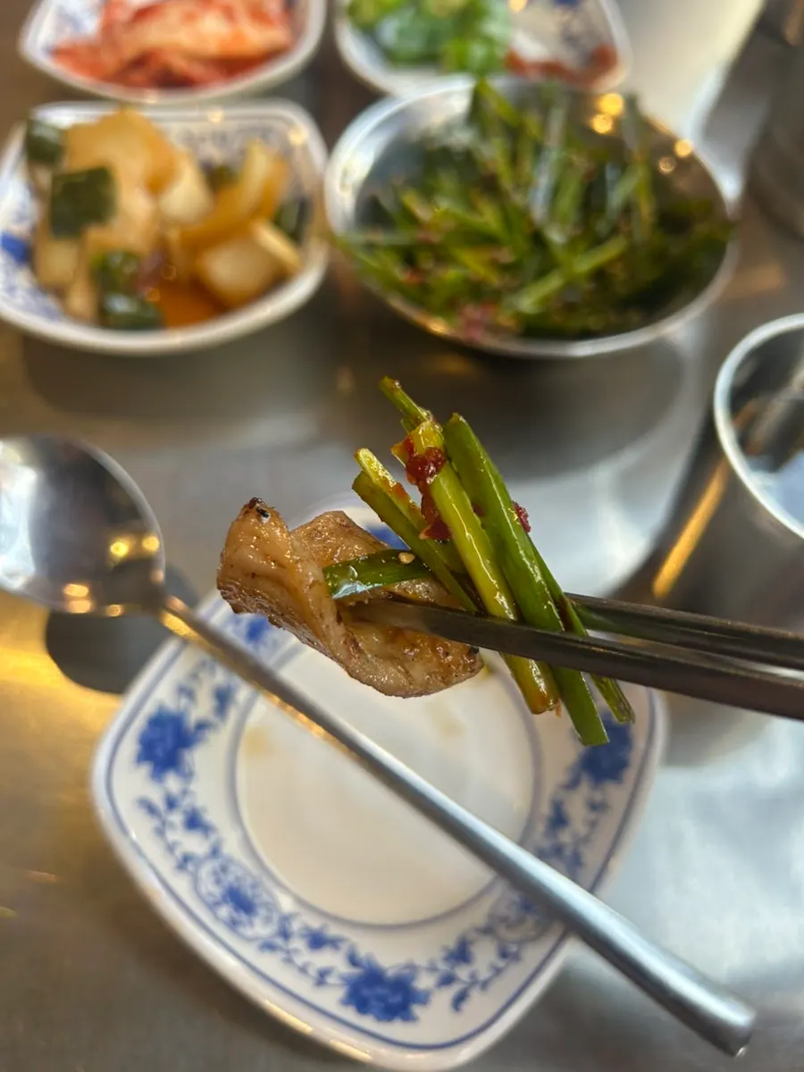 Staff taking care of the beef tripe and intestine grill