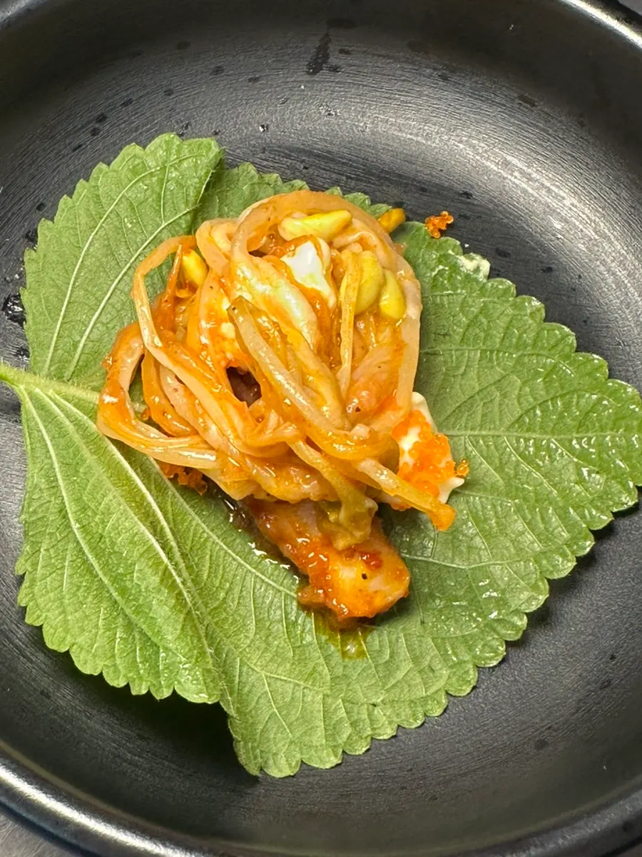 Perilla leaf wrap topped with flying fish roe