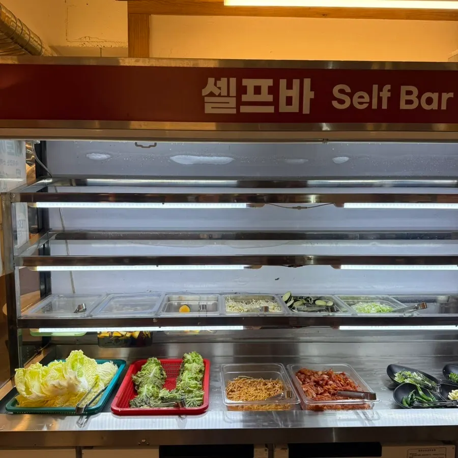 Menu board listing makchang and beef dishes at Chammak Isu Station Branch