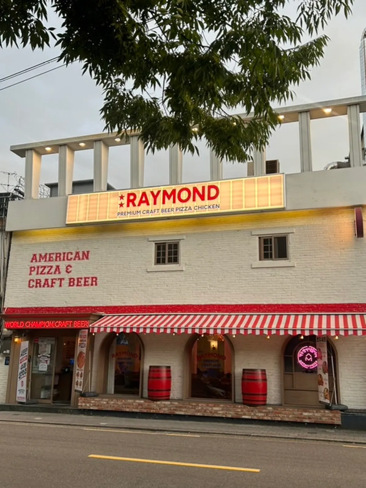 Exterior of Raymond Isu Branch in vintage blue and red