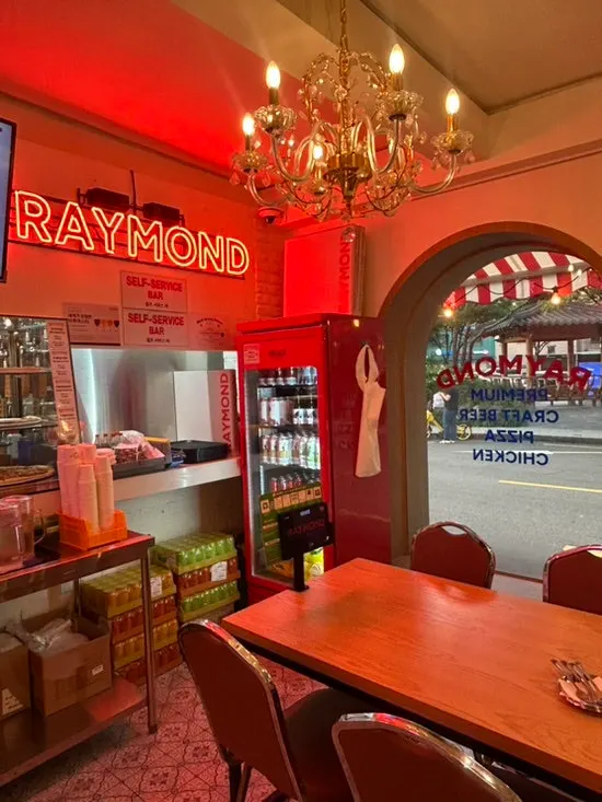 Raymond Isu Branch interior with a blue-and-red color scheme