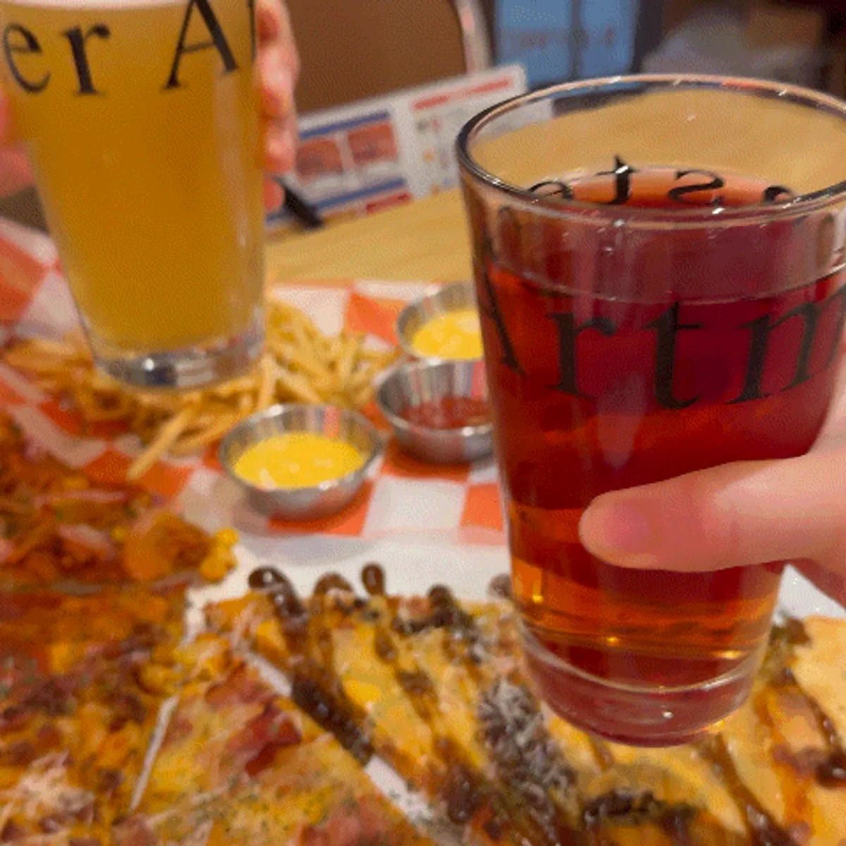 Pizza and craft beer spread at Raymond Isu Branch