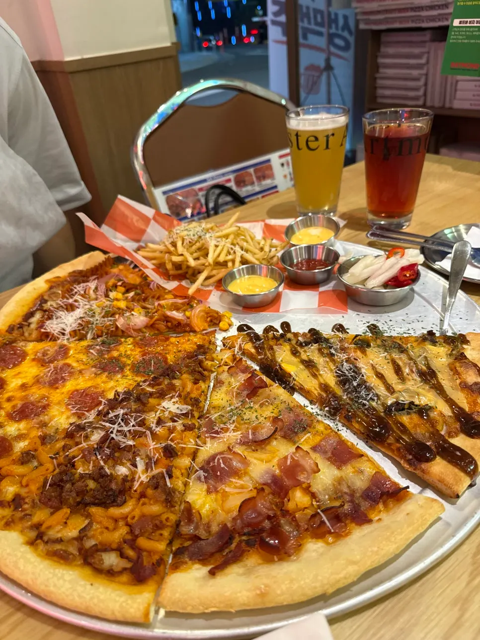 Large slice pizzas filling the table
