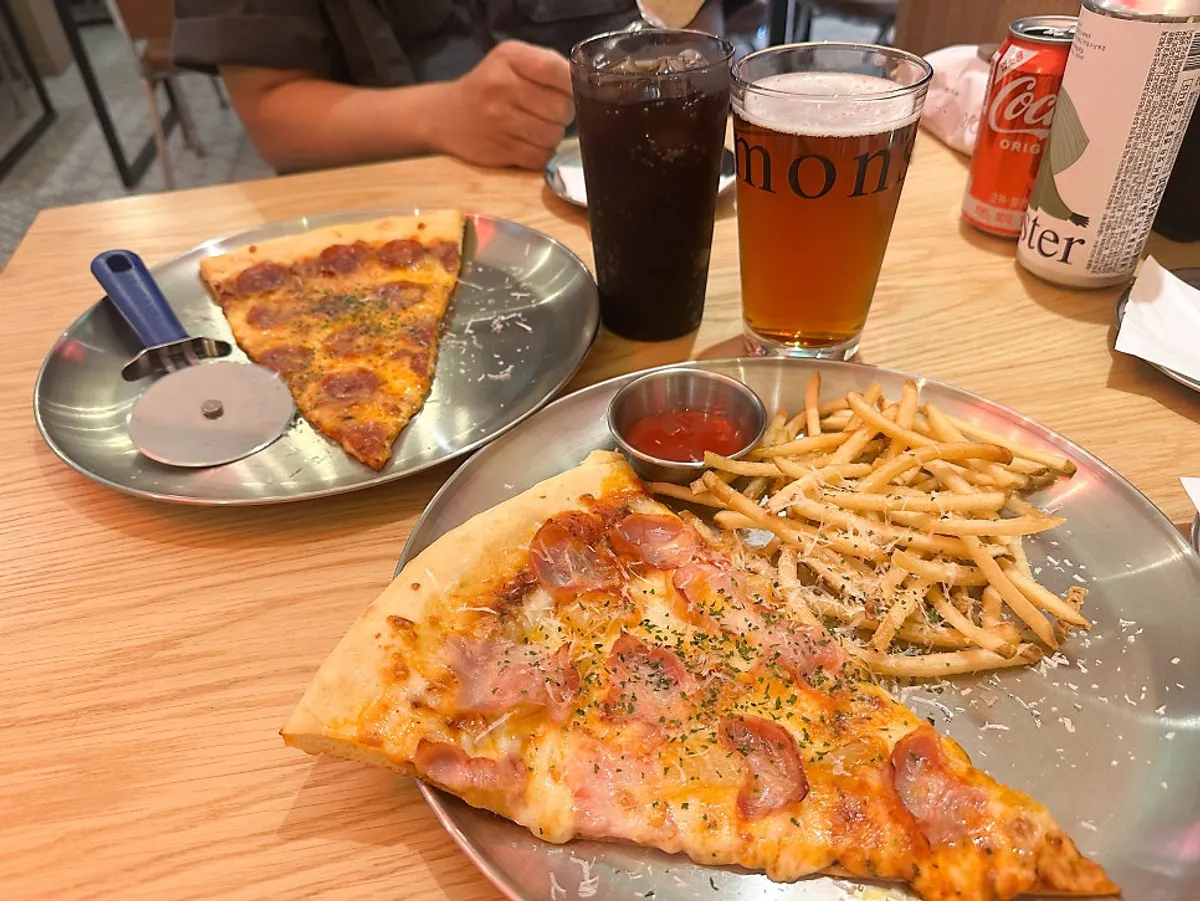 Main pizza and beer spread at Raymond Isu Branch