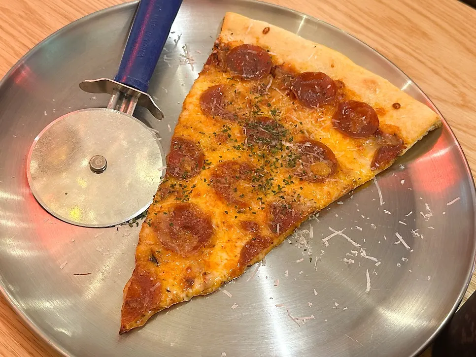 Classic pepperoni pizza slice