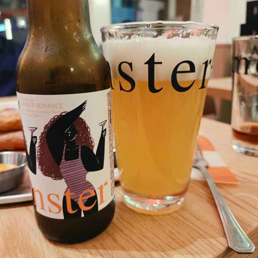 A glass of the summer-limited peach beer Summer Romance