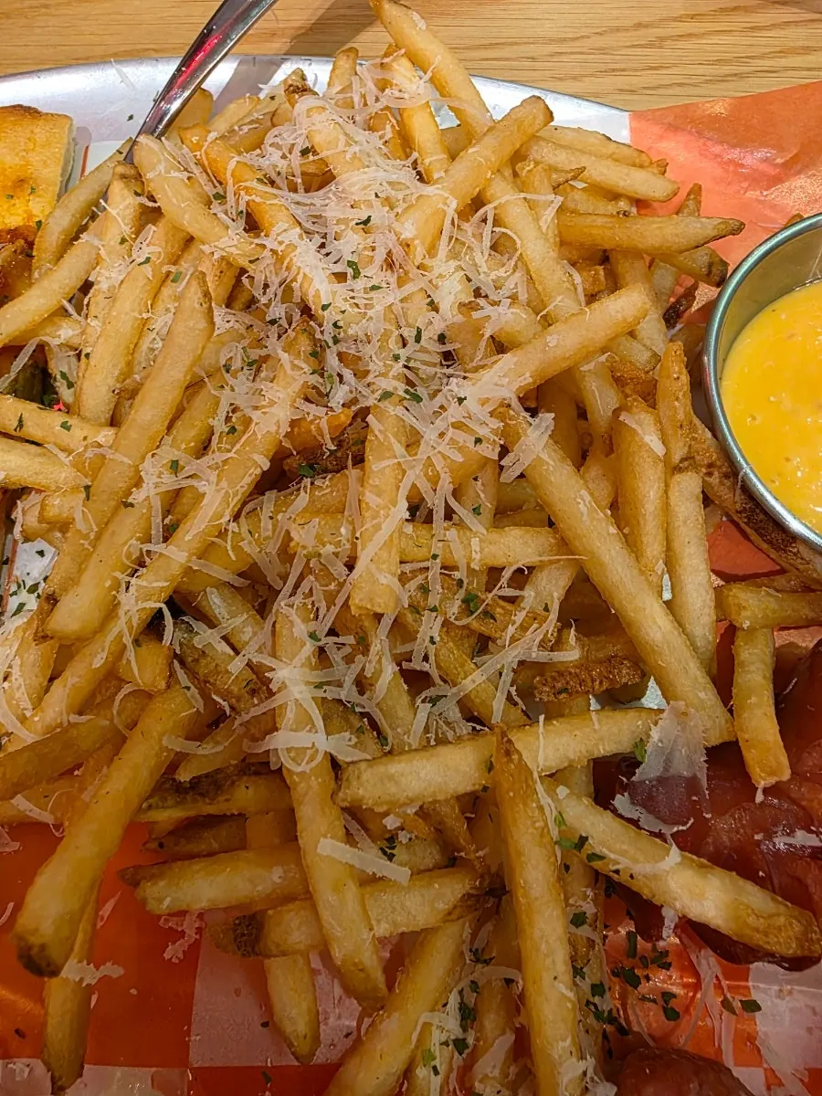 Topped pizza and truffle fries
