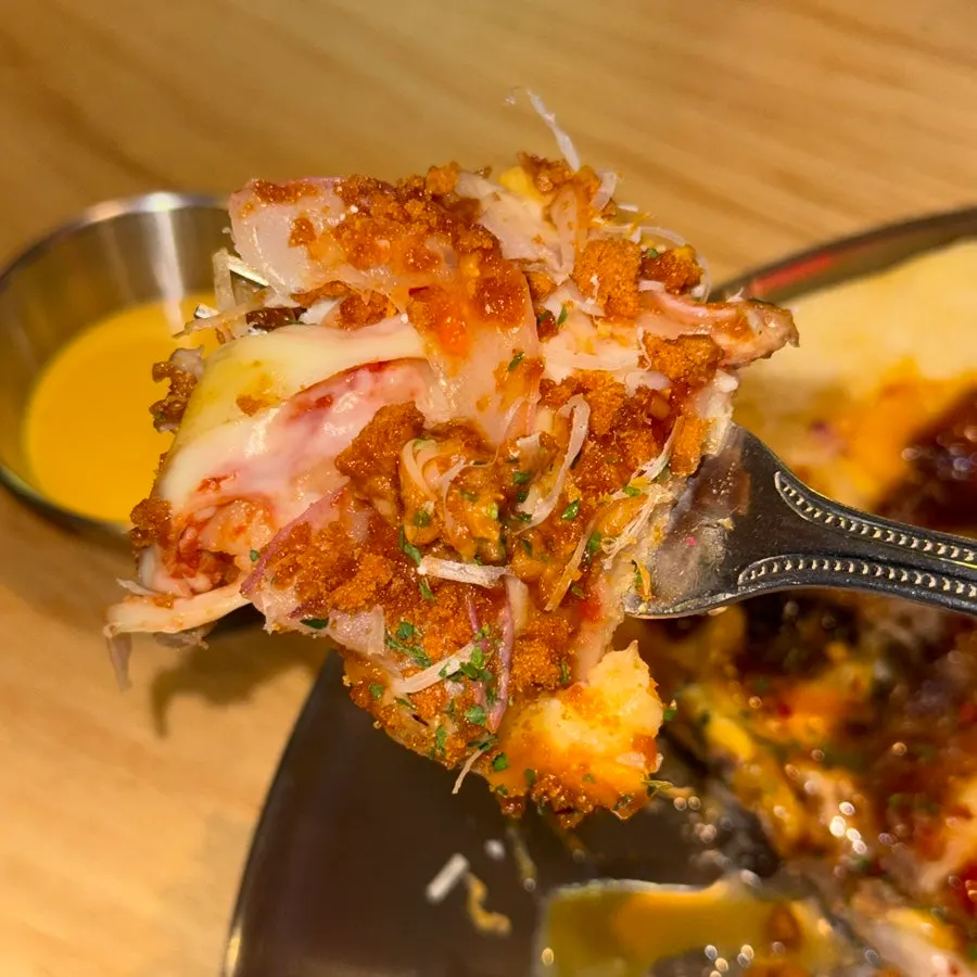 Lotus pizza cut in half to share