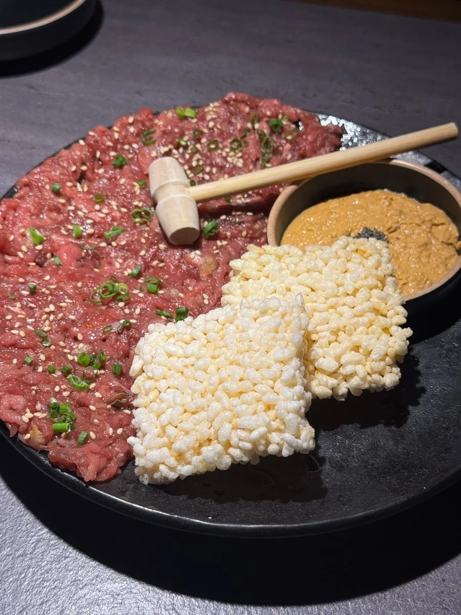 Burnt rice monkfish liver yukhoe with a mini wooden hammer