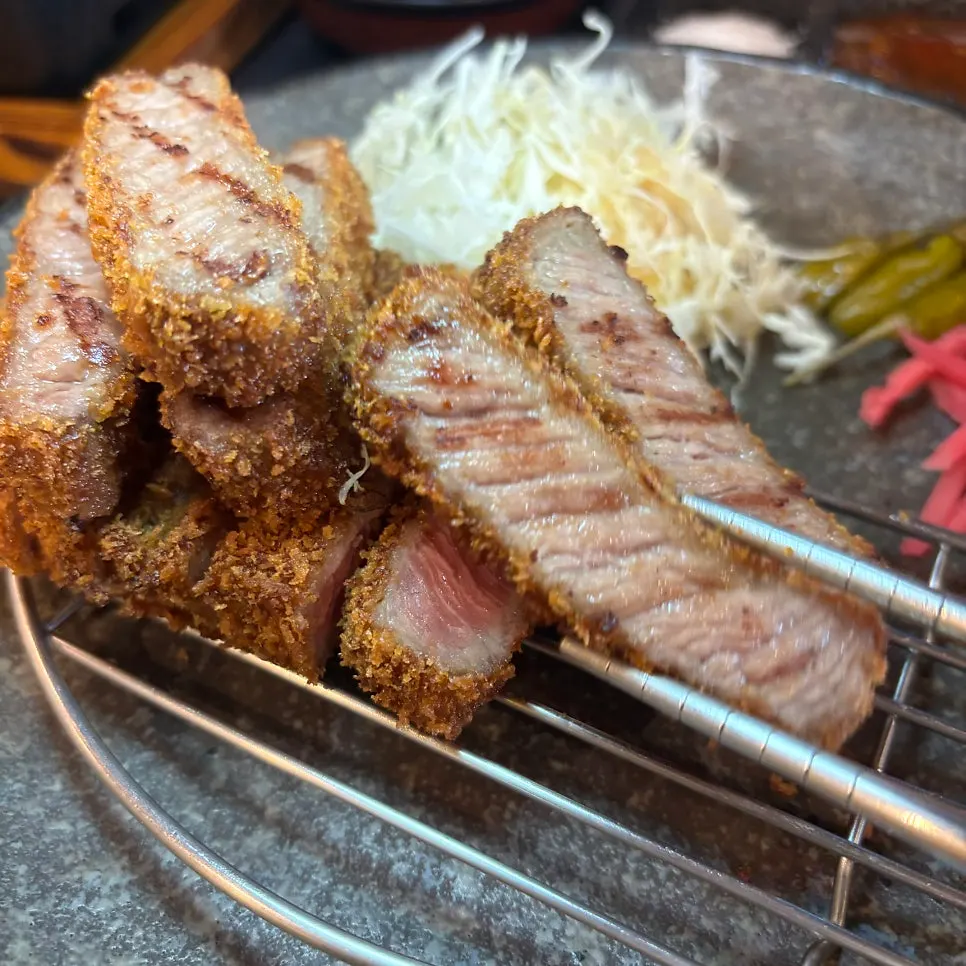 A single piece of gyukatsu on the personal stove