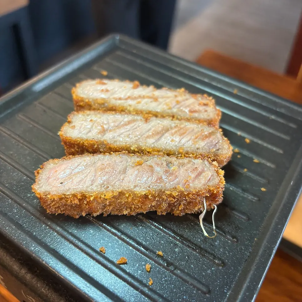 A piece of gyukatsu grilled to taste