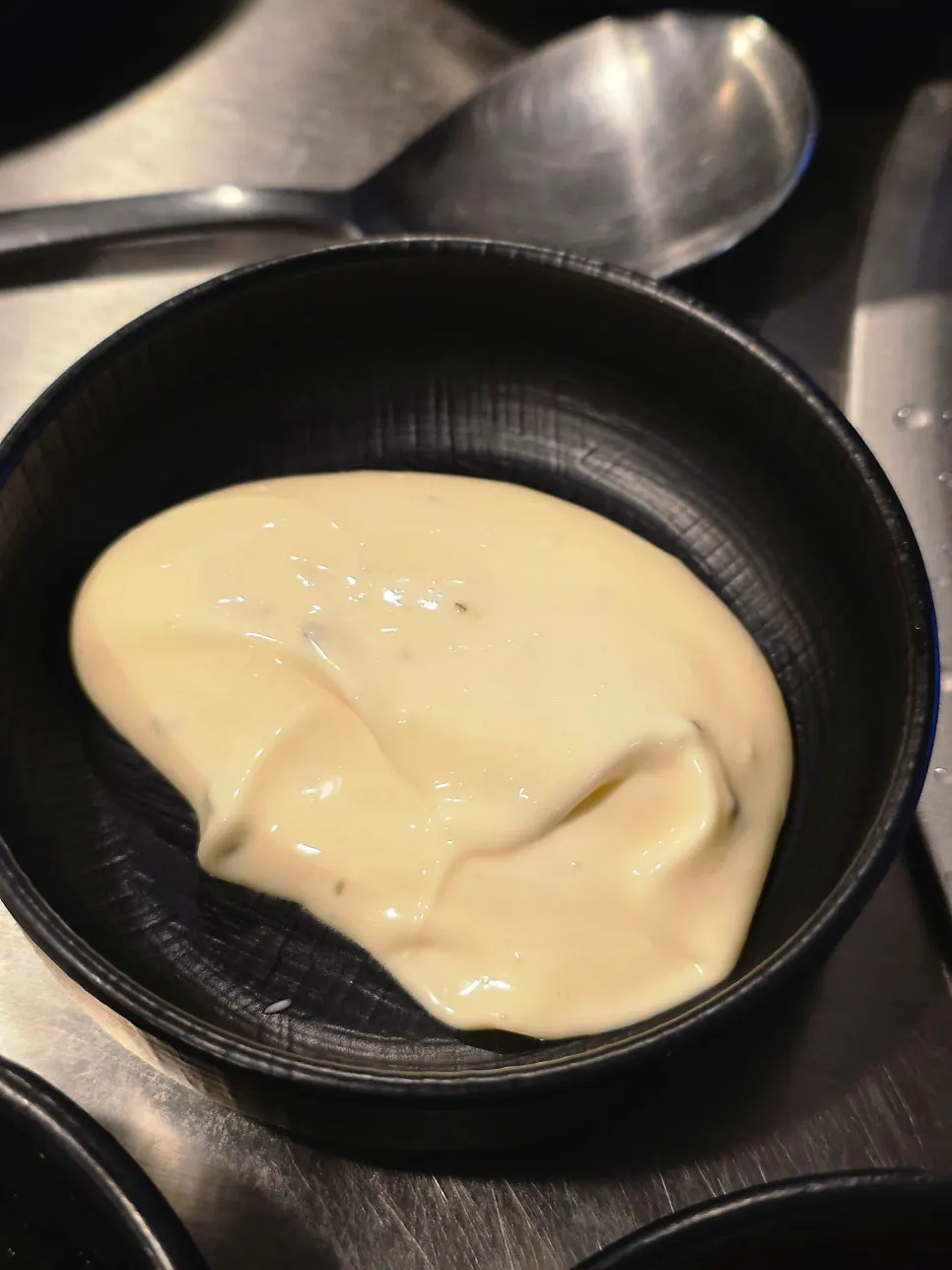 Plate of mayo sauce and flying fish roe
