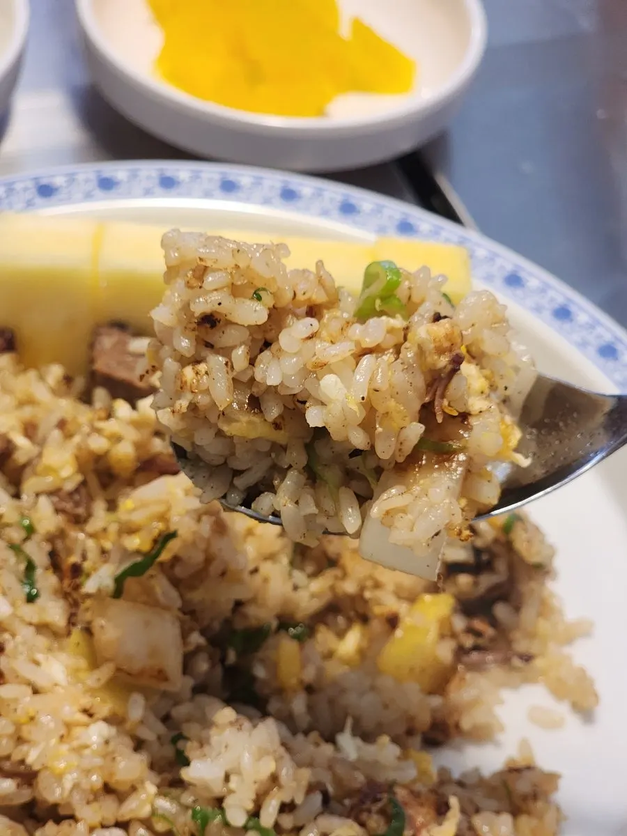Spoonful of pineapple fried rice