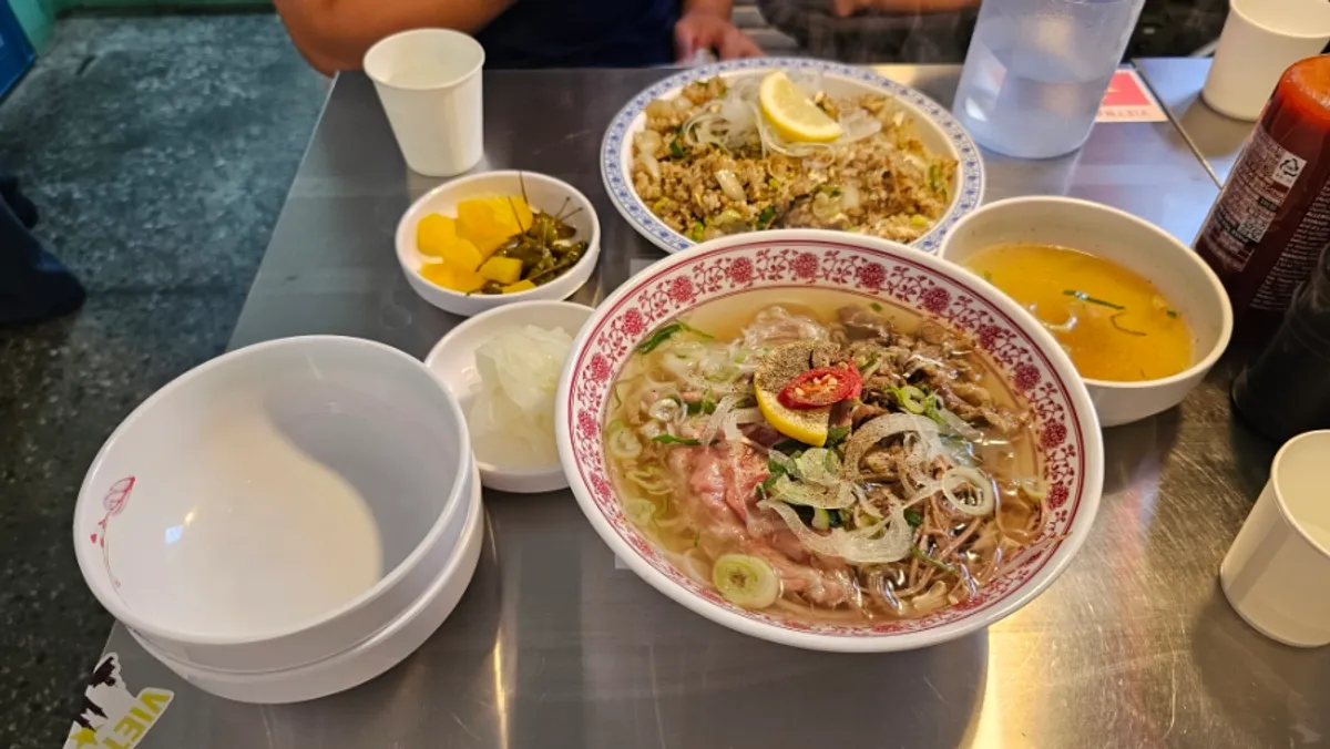 Self-serve bar with rice and side dishes ready