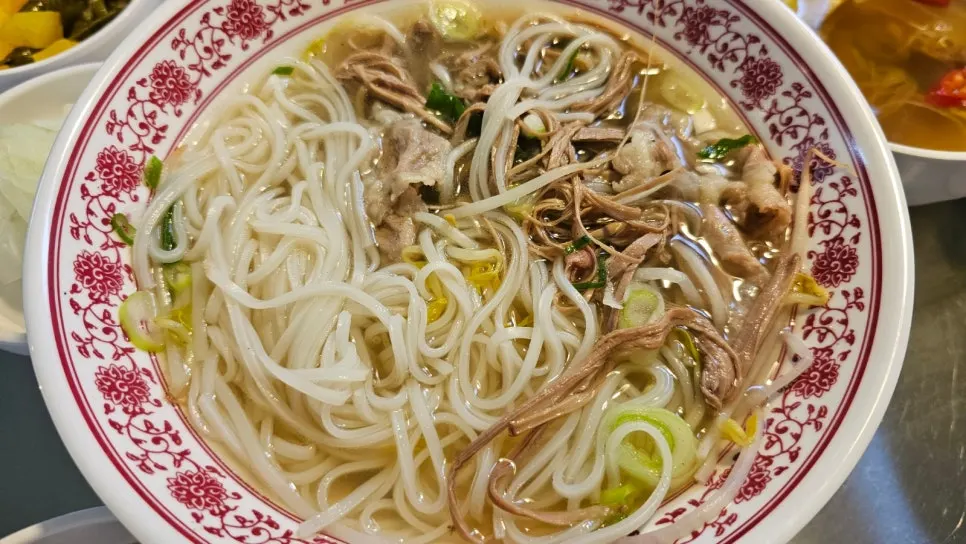 Mixed pho and chicken fried rice set on the table
