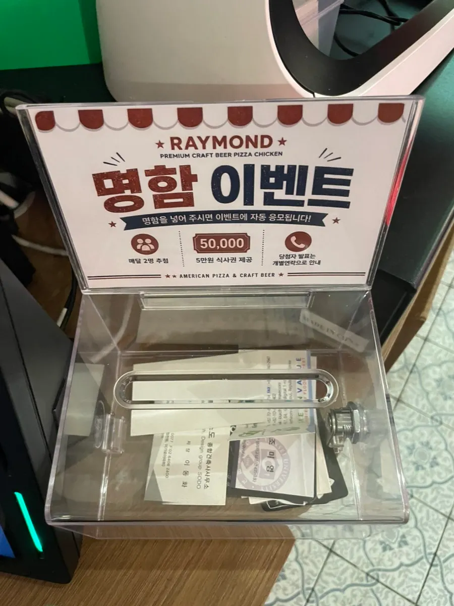 Pizza takeout boxes at Raymond Isu Branch
