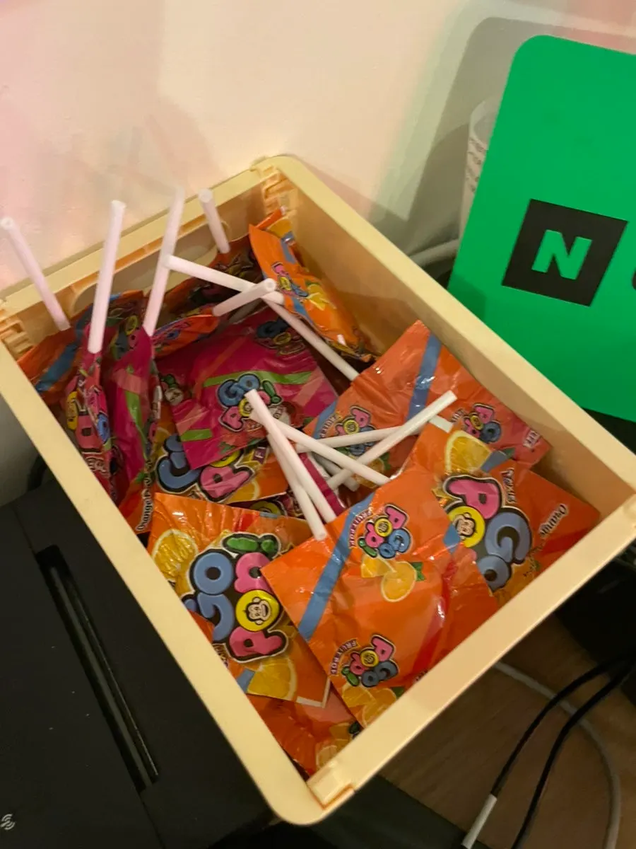 Business card event signage and palate-cleansing candy