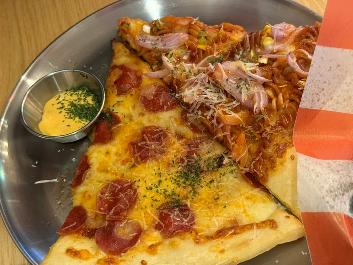 Pizza and craft beer spread at Raymond Isu Branch