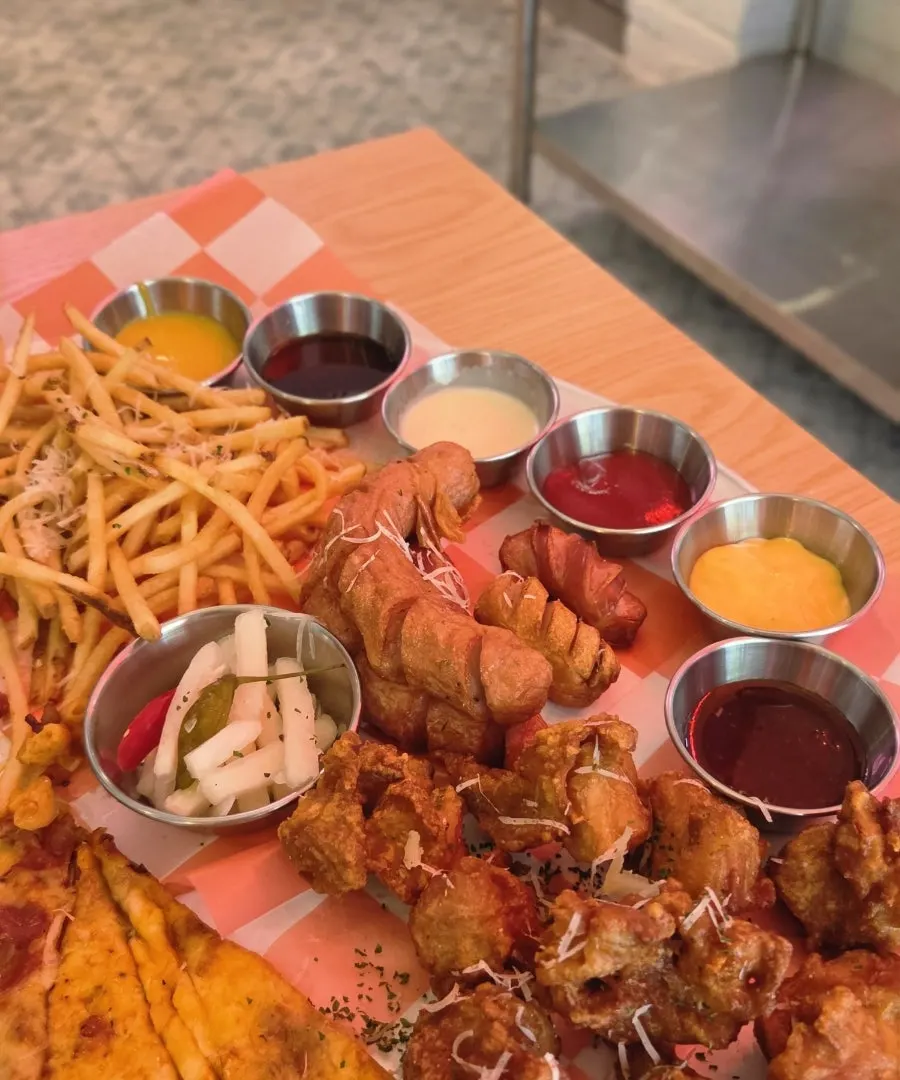 Various dipping sauces served with the pizza