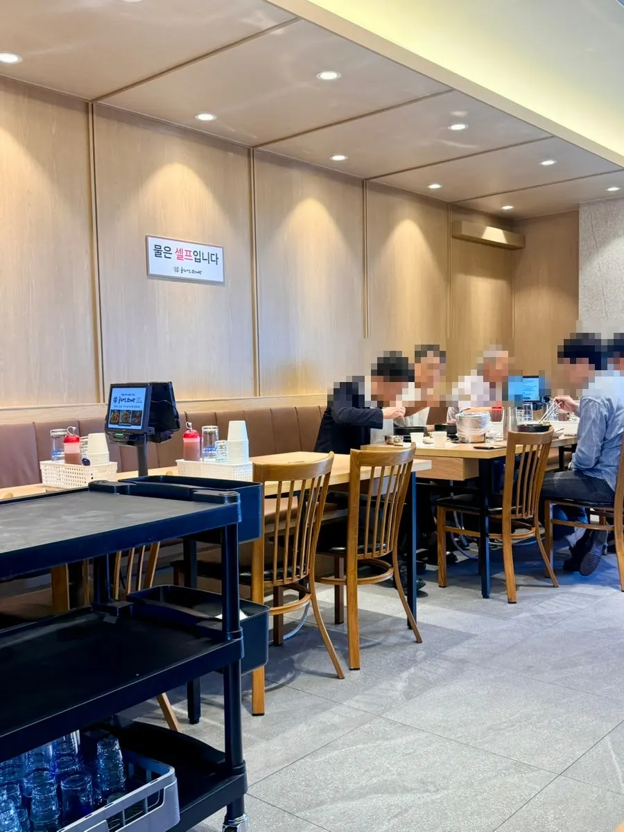 Gamjatang restaurant interior with floor-to-ceiling windows