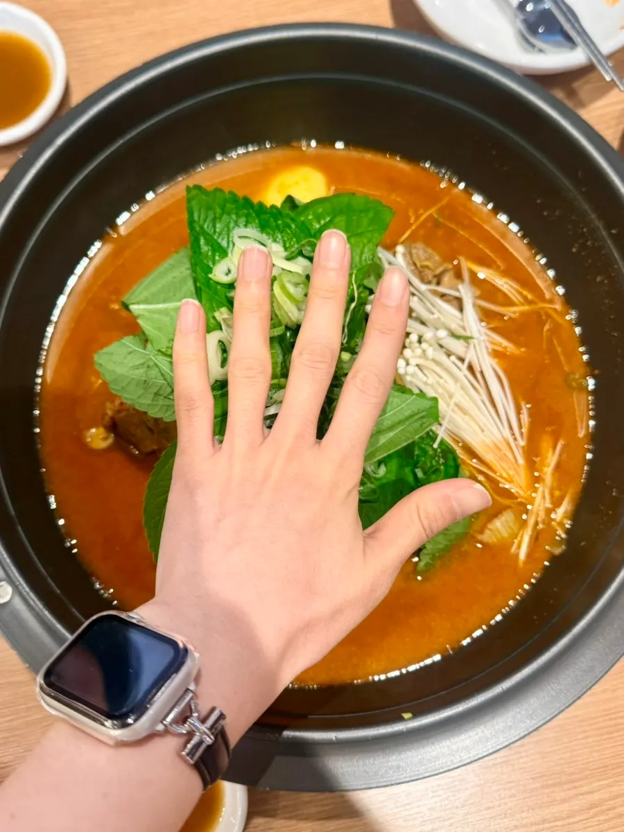 Gamjatang served in a giant cauldron