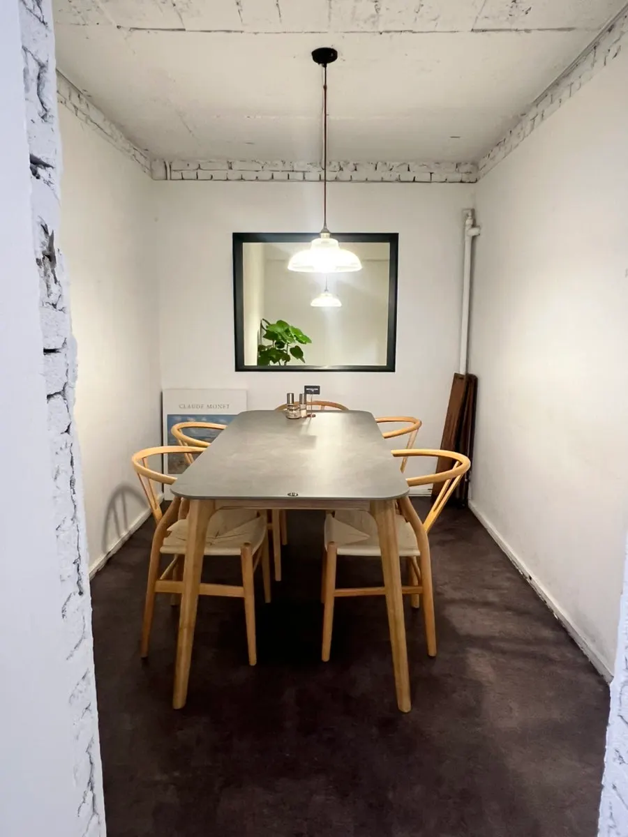 White and wood-toned restaurant interior