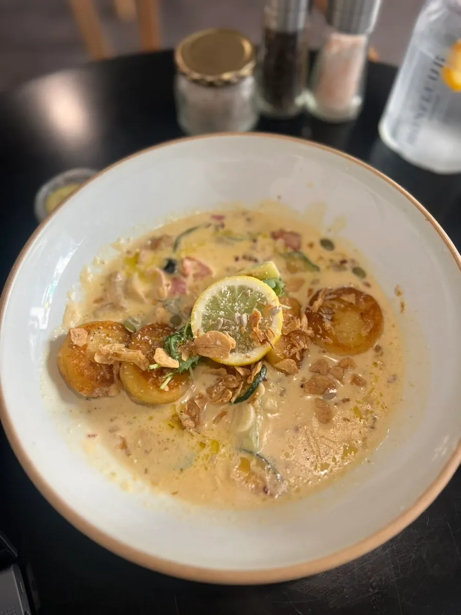 Creamy gnocchi served with pickles