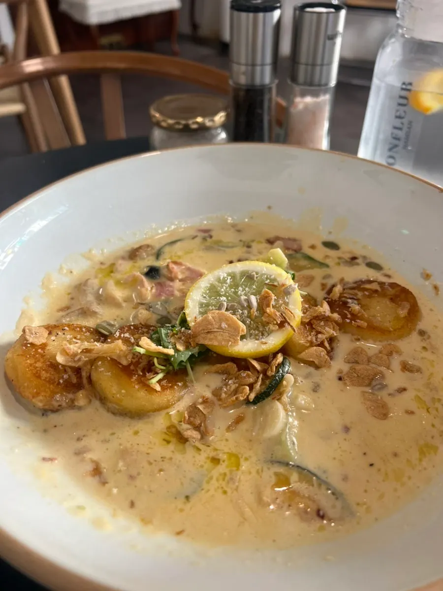 Gnocchi with cream sauce and ingredients