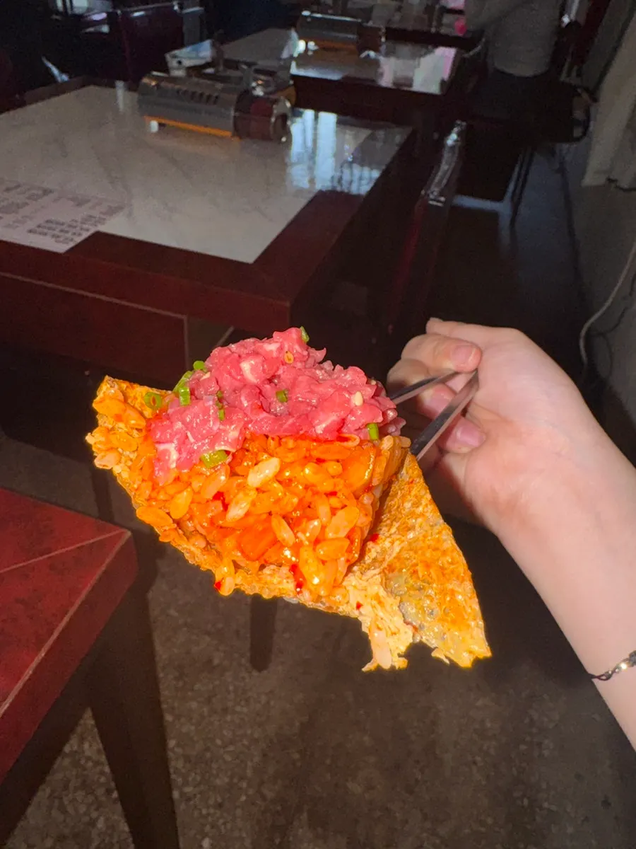 Four pieces of yukhoe yubu-chobap generously topped with beef tartare
