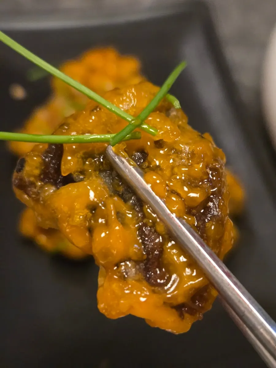 Appetizer served over julienned vegetables