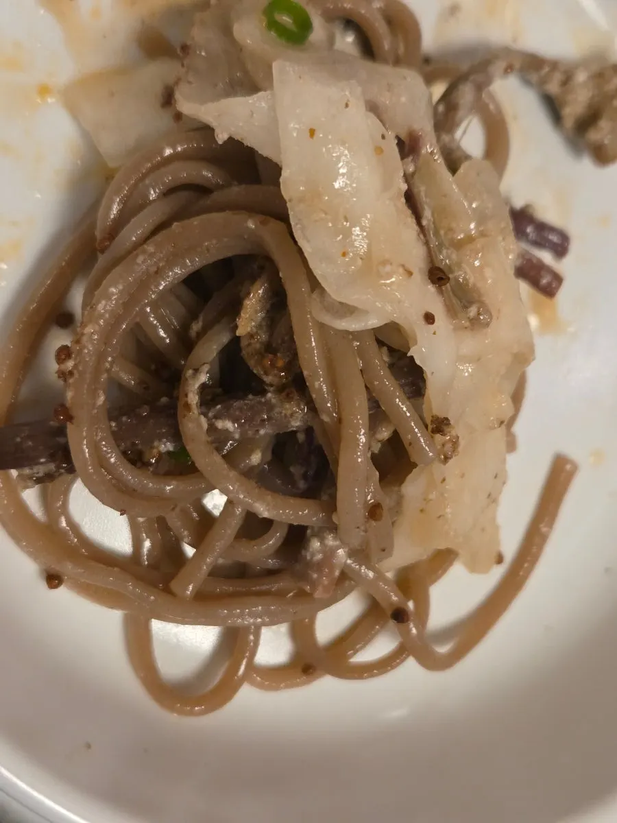 A soft appetizer lifted on a spoon