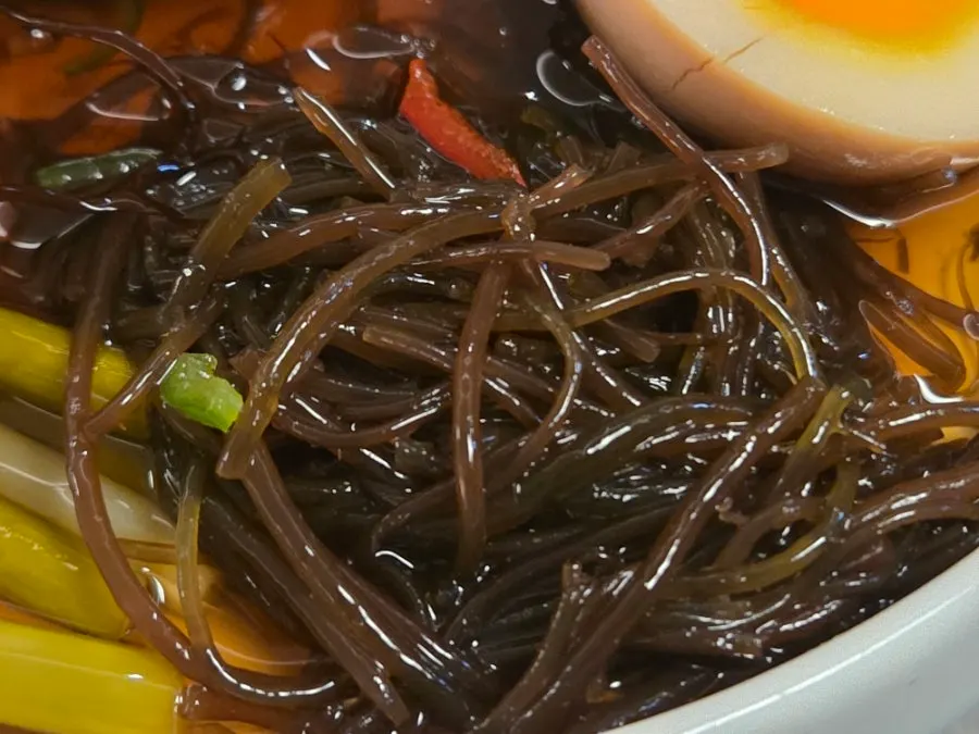 Close-up of the glossy seafood jang main dish