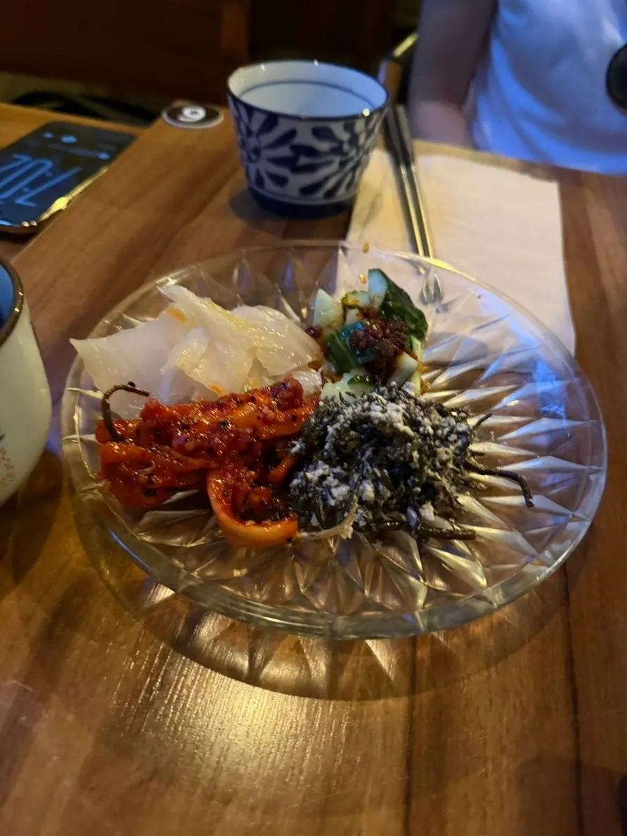 Four basic side dishes including white kimchi and dried radish