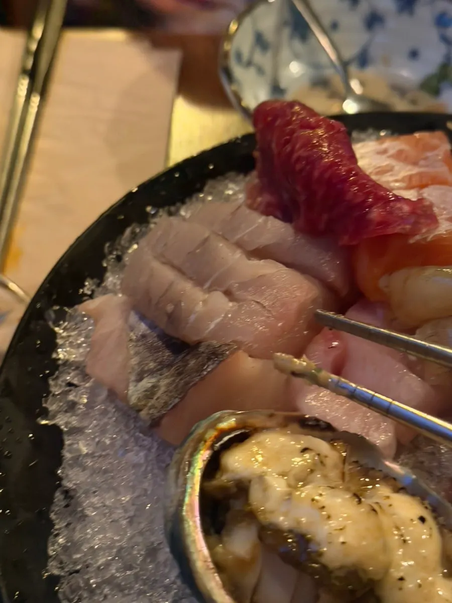 Plump raw shrimp topped with roe