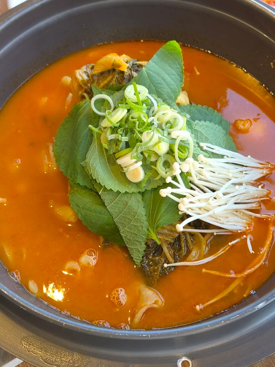 Weekday lunch gamjatang table setting in Itaewon
